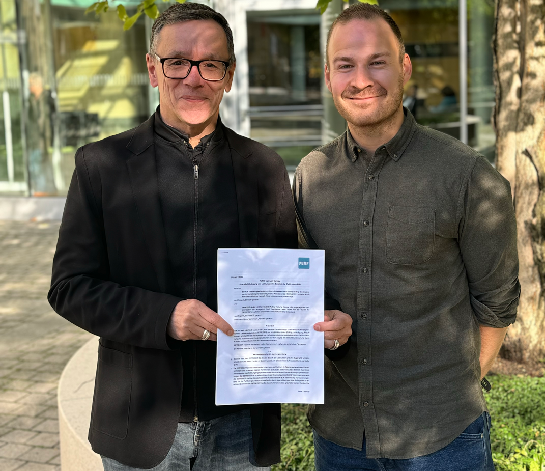 Helmut Rietzer Managing Director 800 Volt Technologies (links) und Marvin Beccard Geschäftsführer Lade.ZEIT GmbH (rechts)